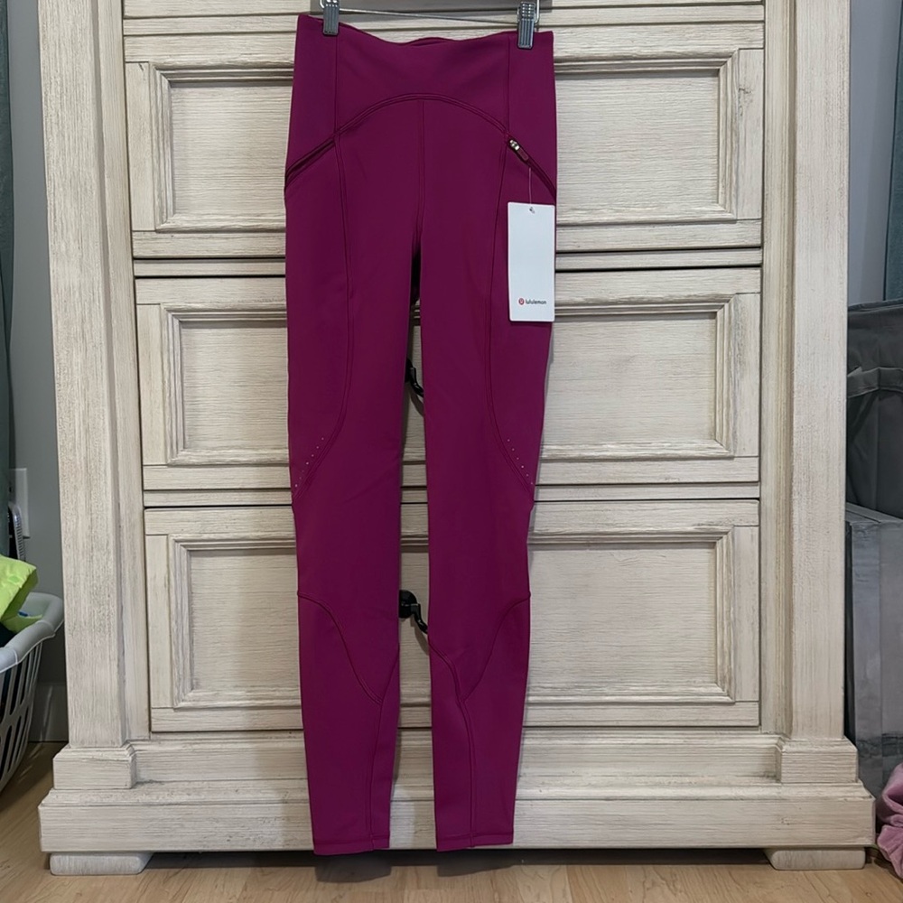 Lululemon rain repellent HR run tight 28” size 4